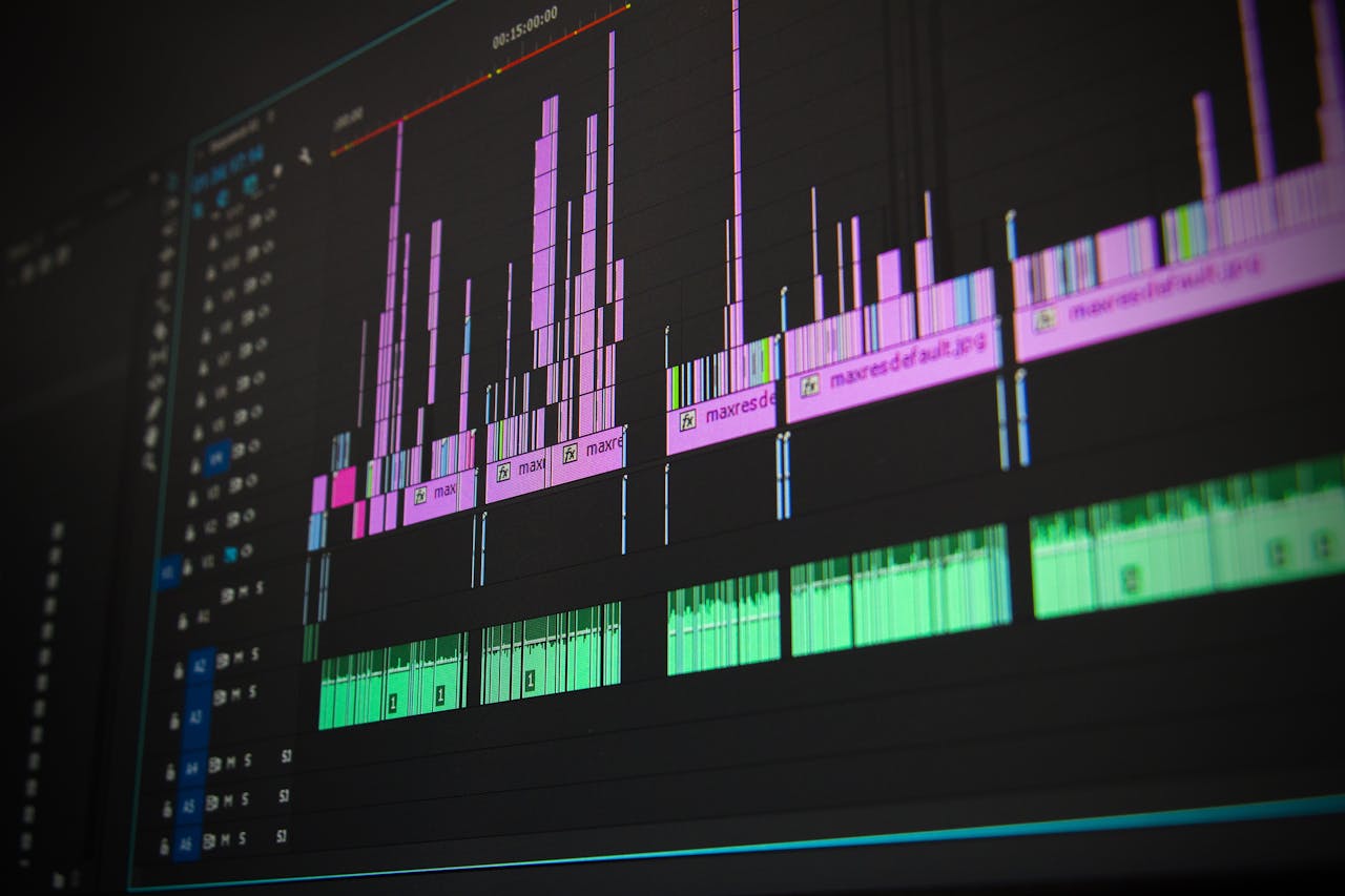 Home Close-up of a professional audio and video editing software interface with waveform displays.